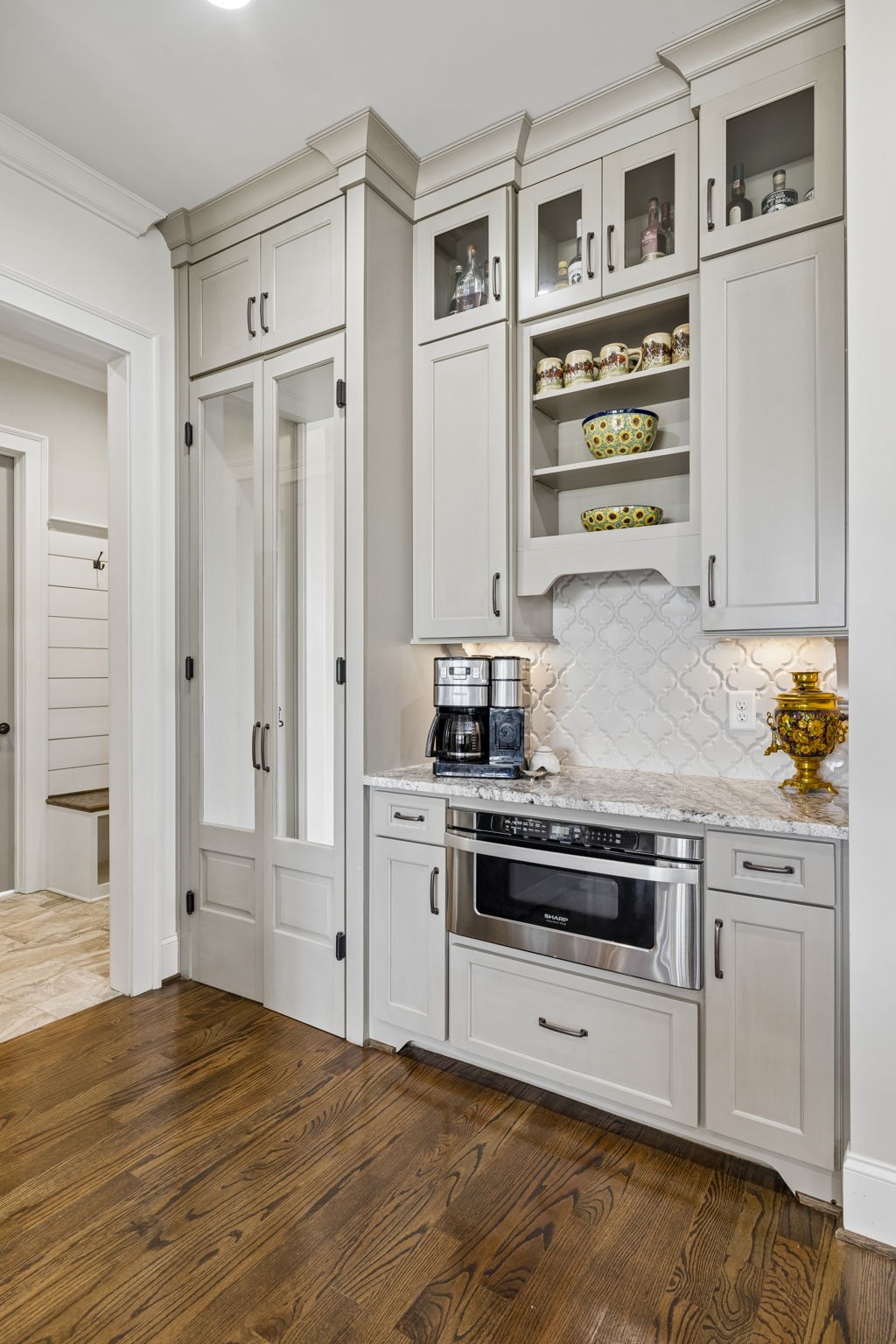 6033 Native Pony Trail College Grove, TN 37046 - Photo 40 of 87 a kitchen with stainless steel appliances a stove and a refrigerator