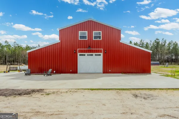 a view of a lake with a big yard