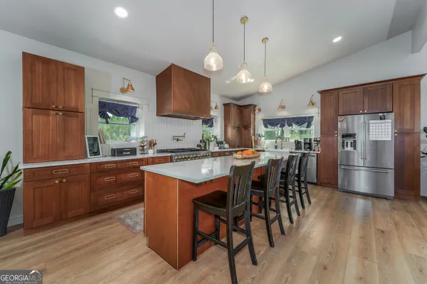 a view of a hallway with windows