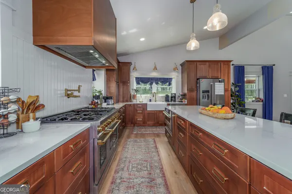 a bedroom with a bed and a dresser in it