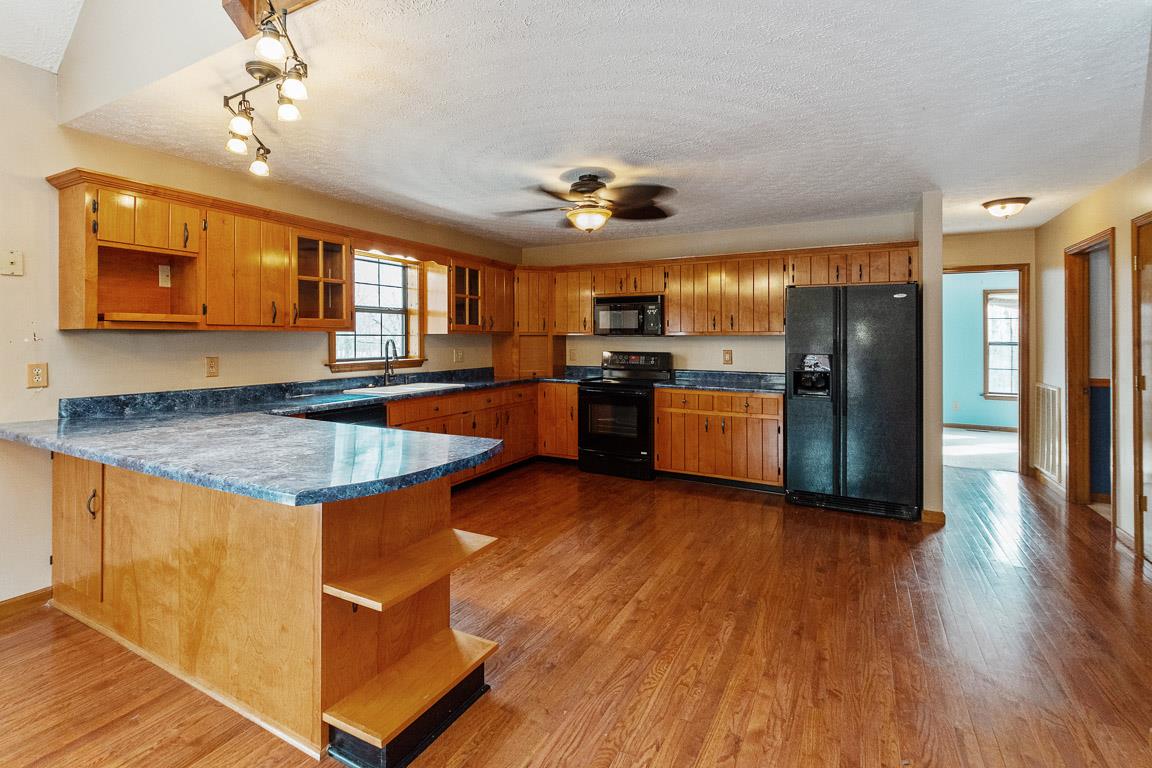 161 Jerry Smith Road Indian Mound, TN 37079 - Photo 7 of 29 Breakfast Bar & tons of cabinets