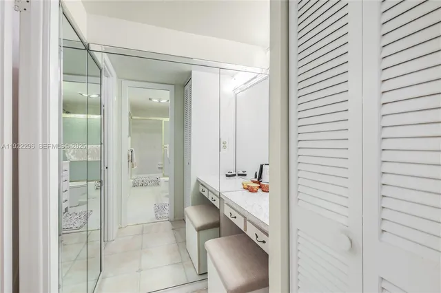 a bathroom with a tub and shower