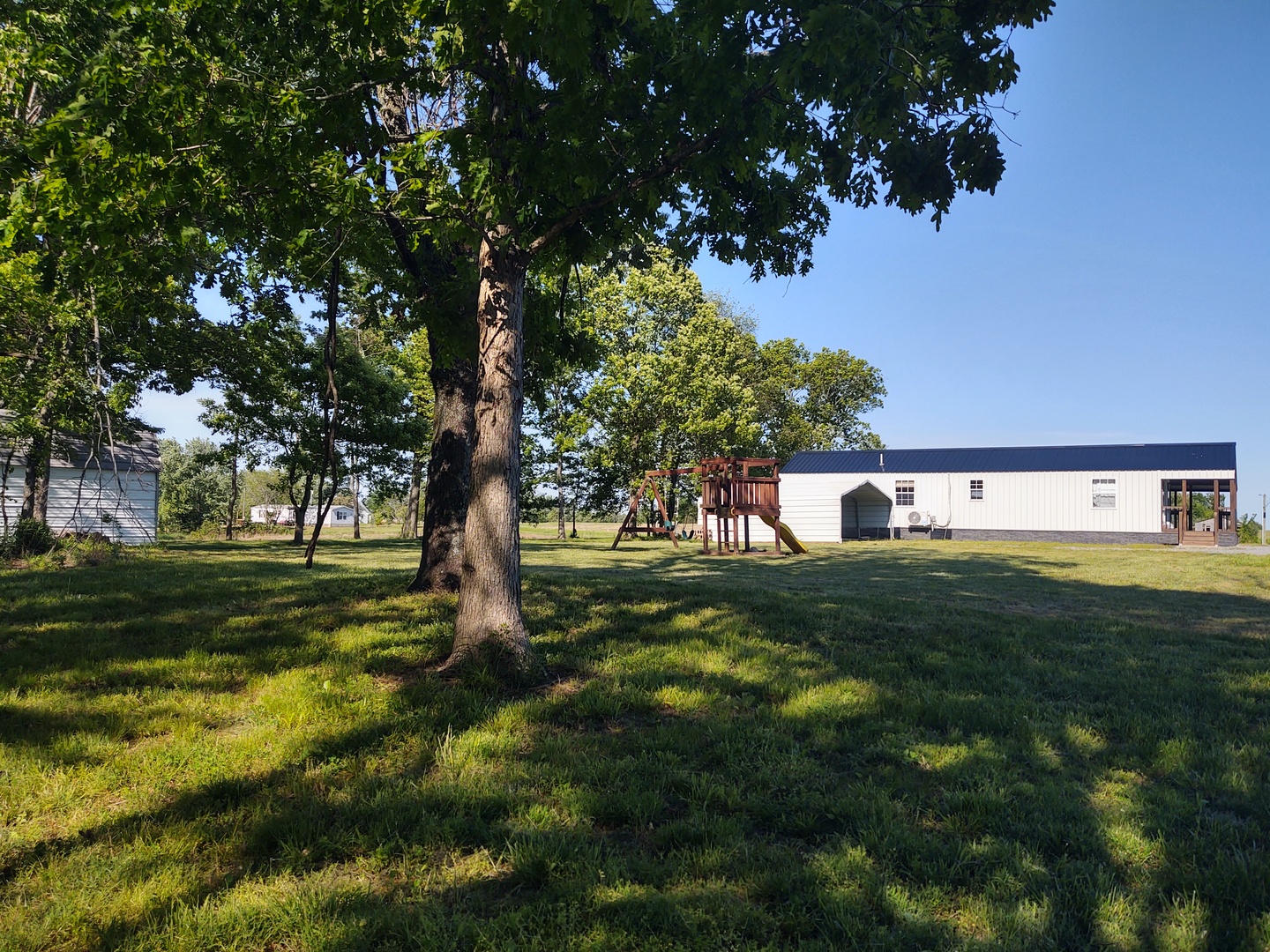 4745 Gum Springs Road Tunnel Hill, IL 62972 - Photo 14 of 15 a view of a big yard with large trees