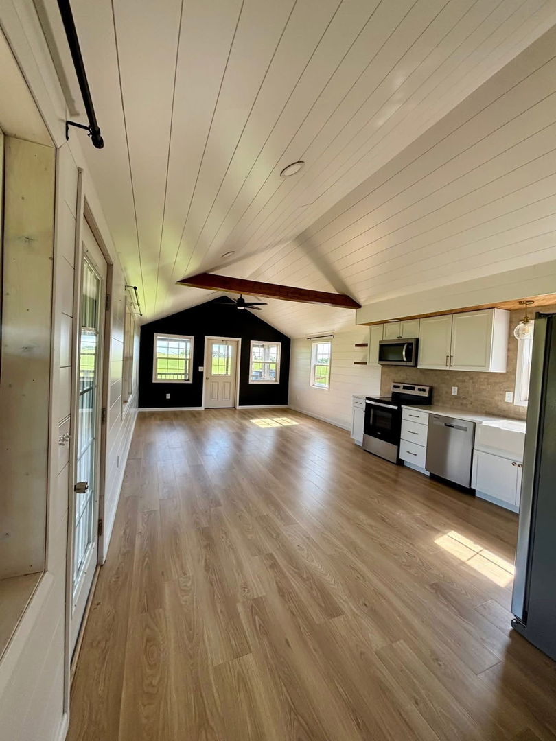 4745 Gum Springs Road Tunnel Hill, IL 62972 - Photo 3 of 15 a view of kitchen with furniture and wooden floor