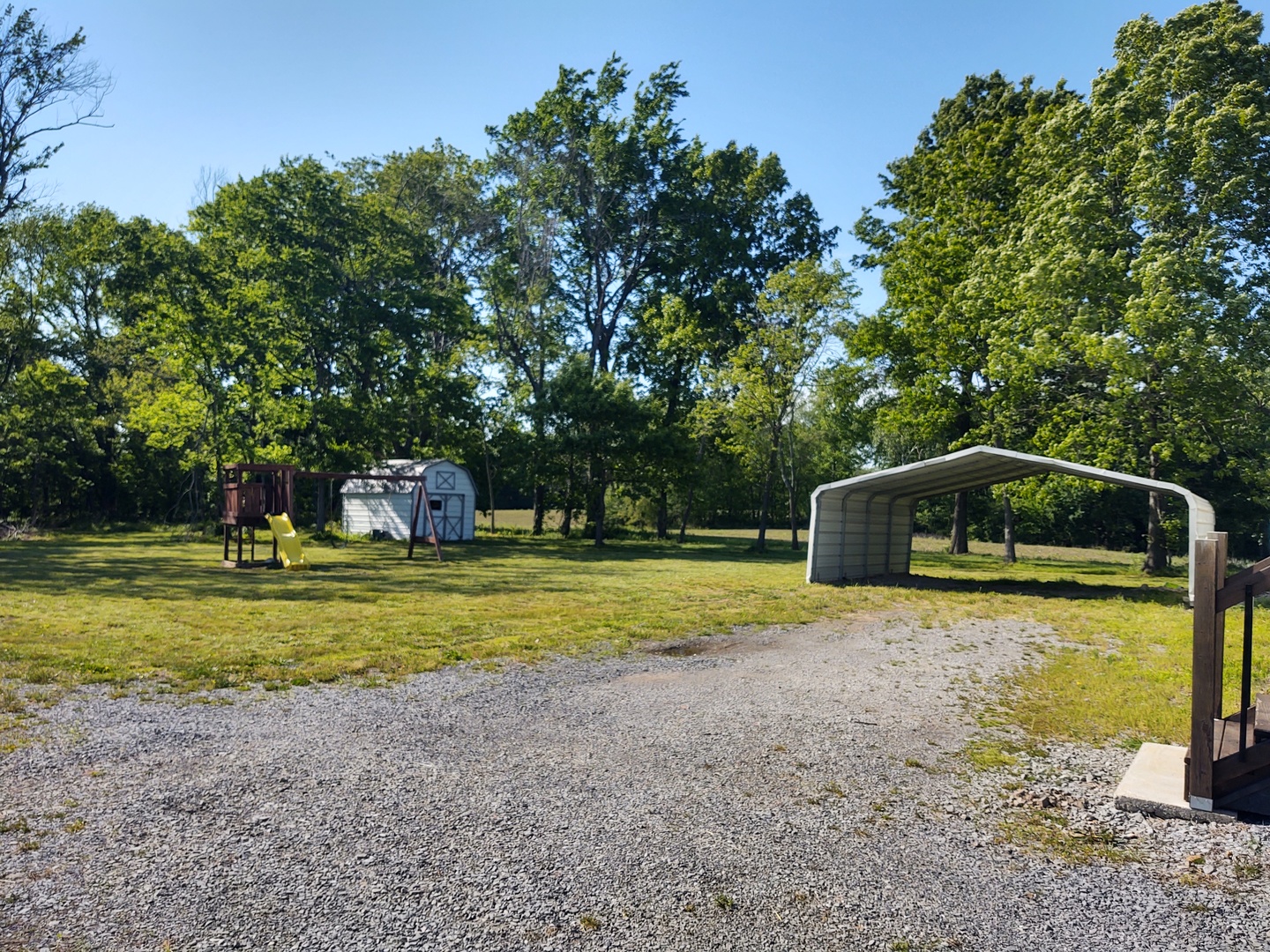 4745 Gum Springs Road Tunnel Hill, IL 62972 - Photo 10 of 15 a front view of a house with a yard and trees