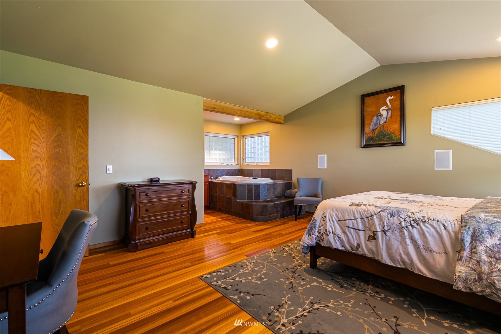 1415 37th Street Bellingham, WA 98229 - Photo 24 of 37 a bedroom with a bed and wooden floor
