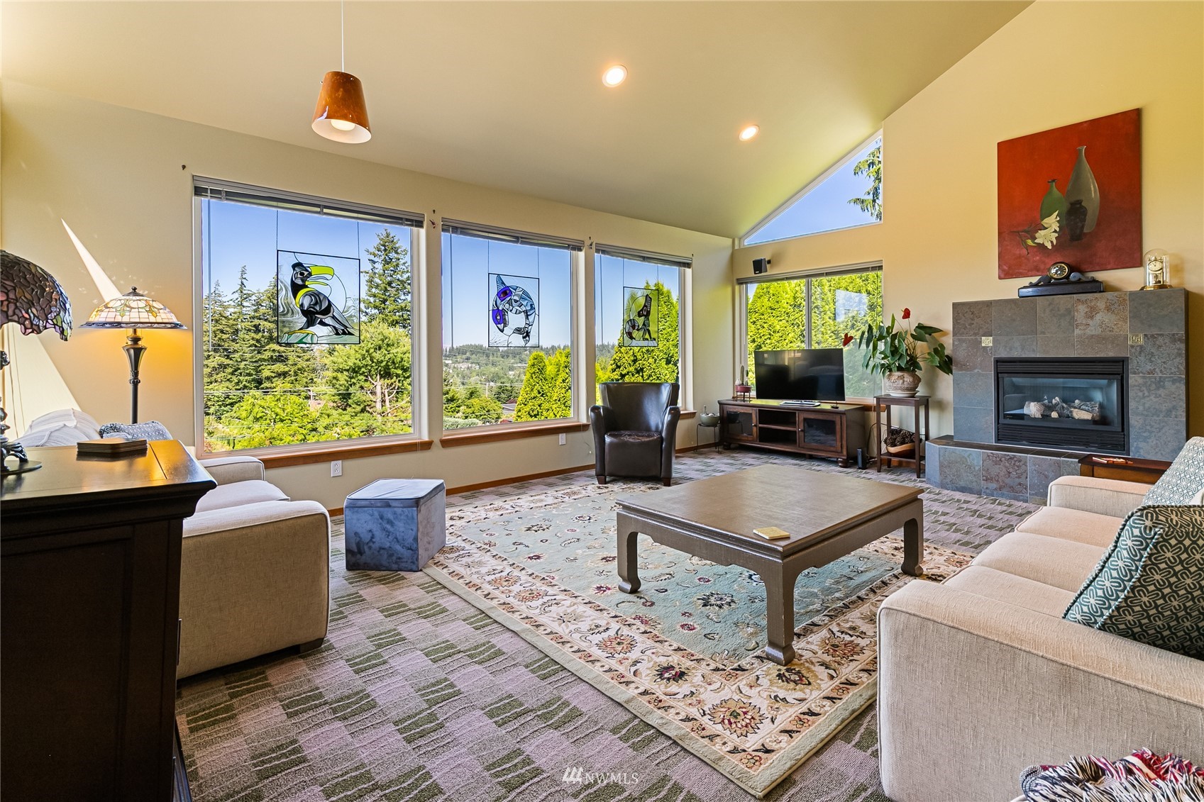 1415 37th Street Bellingham, WA 98229 - Photo 10 of 37 a living room with furniture and a fireplace