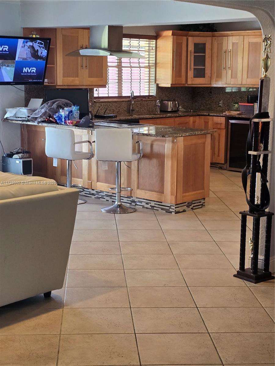 Country Club Ranches Miramar, FL 33027 - Photo 14 of 29 a kitchen with a sink cabinets and appliances