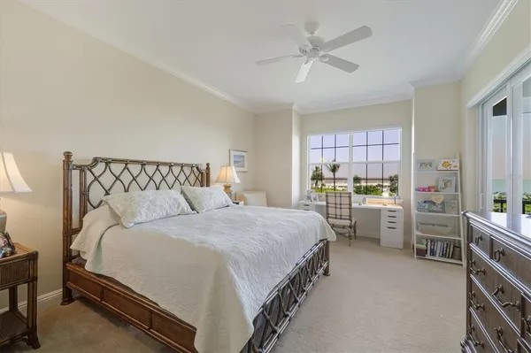 a bedroom with bed and window