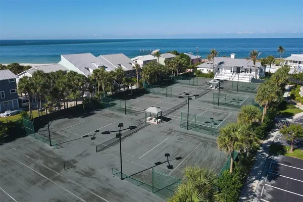 swimming pool with outdoor seating and yard