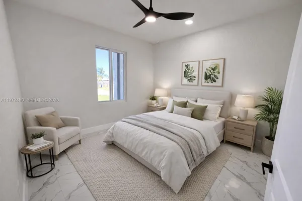 a bedroom with a bed a closet and windows