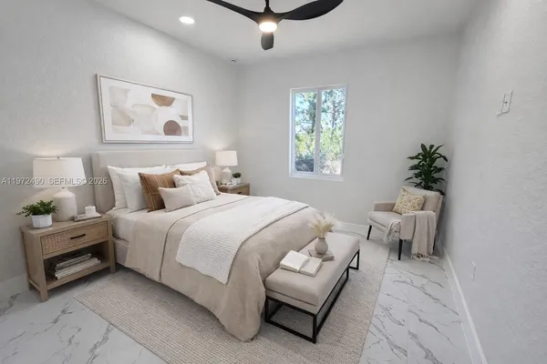 an aerial view of residential house with outdoor space and swimming pool