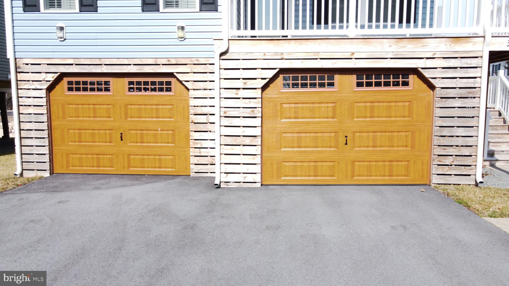 31319 Point Reyes Lane Ocean View, DE 19970 - Photo 18 of 22 ENCLOSED GARAGE w/4 PARKING SPOTS & STORAGE SPACE