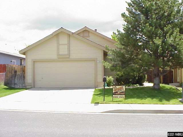 1792 Grand Point Way Reno, NV 89523 - Photo 1 of 1 a small white building in the background with a small yard