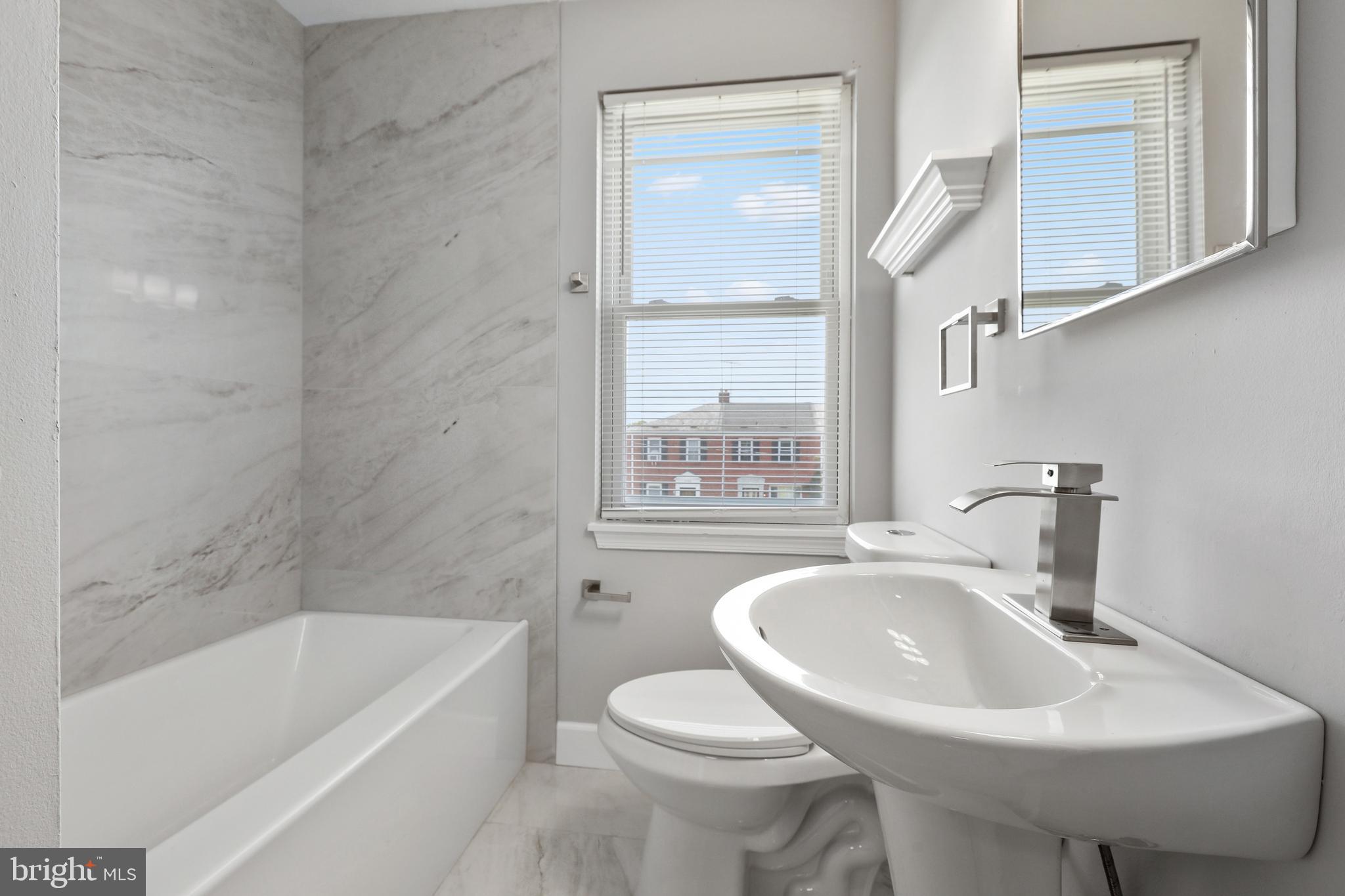 1714 Pin Oak Road Parkville, MD 21234 - Photo 26 of 41 Shower/tub & pedestal sink with medicine cabinet