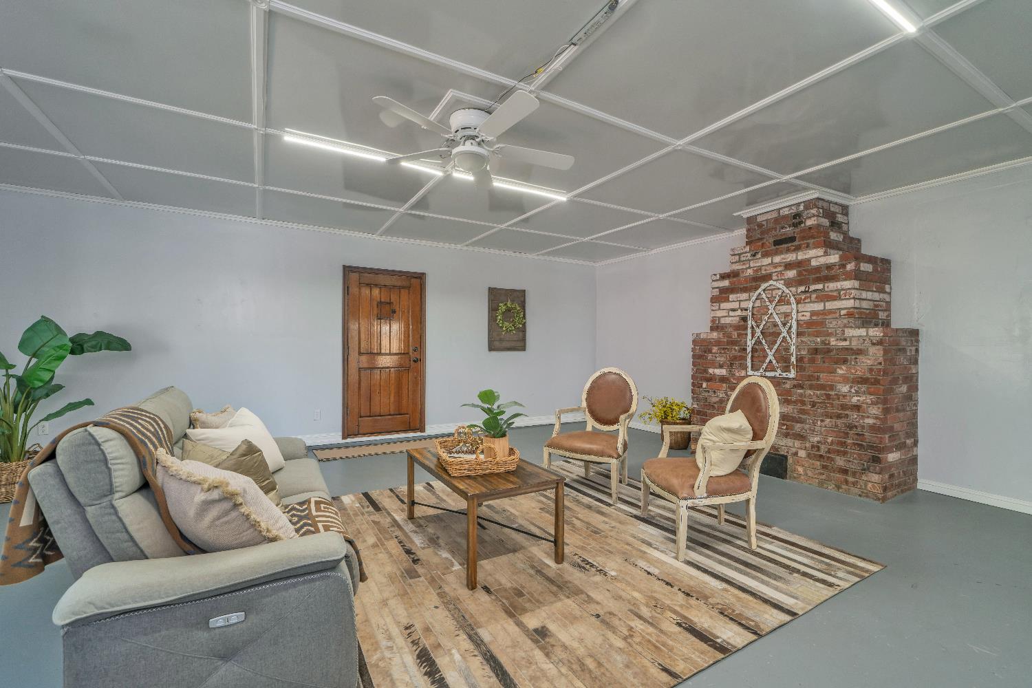 6261 Grizzly Flat Road Somerset, CA 95684 - Photo 24 of 63 a living room with furniture and wooden floor