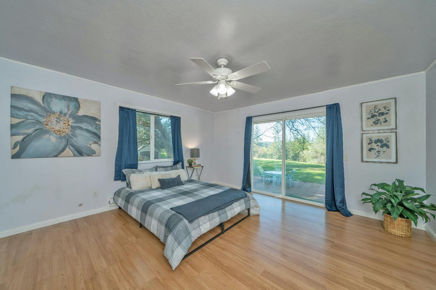 6261 Grizzly Flat Road Somerset, CA 95684 - Photo 29 of 63 a living room with furniture and a large window with wooden floor