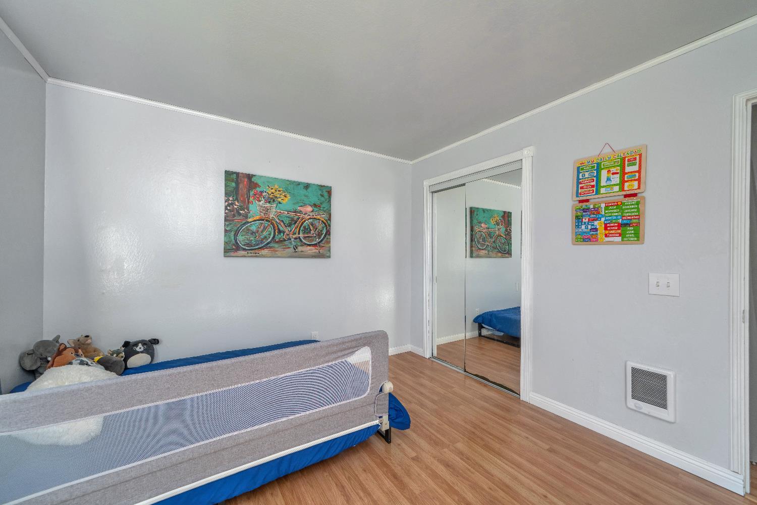 6261 Grizzly Flat Road Somerset, CA 95684 - Photo 36 of 63 a room with wooden floor and couch