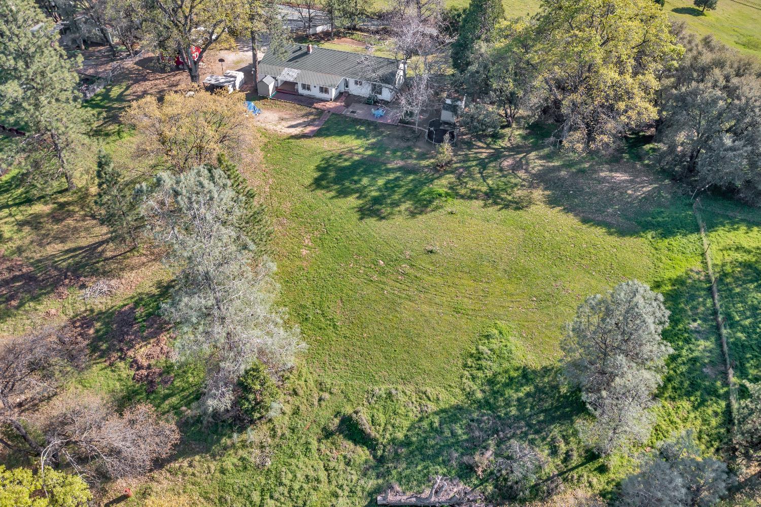 6261 Grizzly Flat Road Somerset, CA 95684 - Photo 9 of 63 a aerial view of residential houses with outdoor space and trees