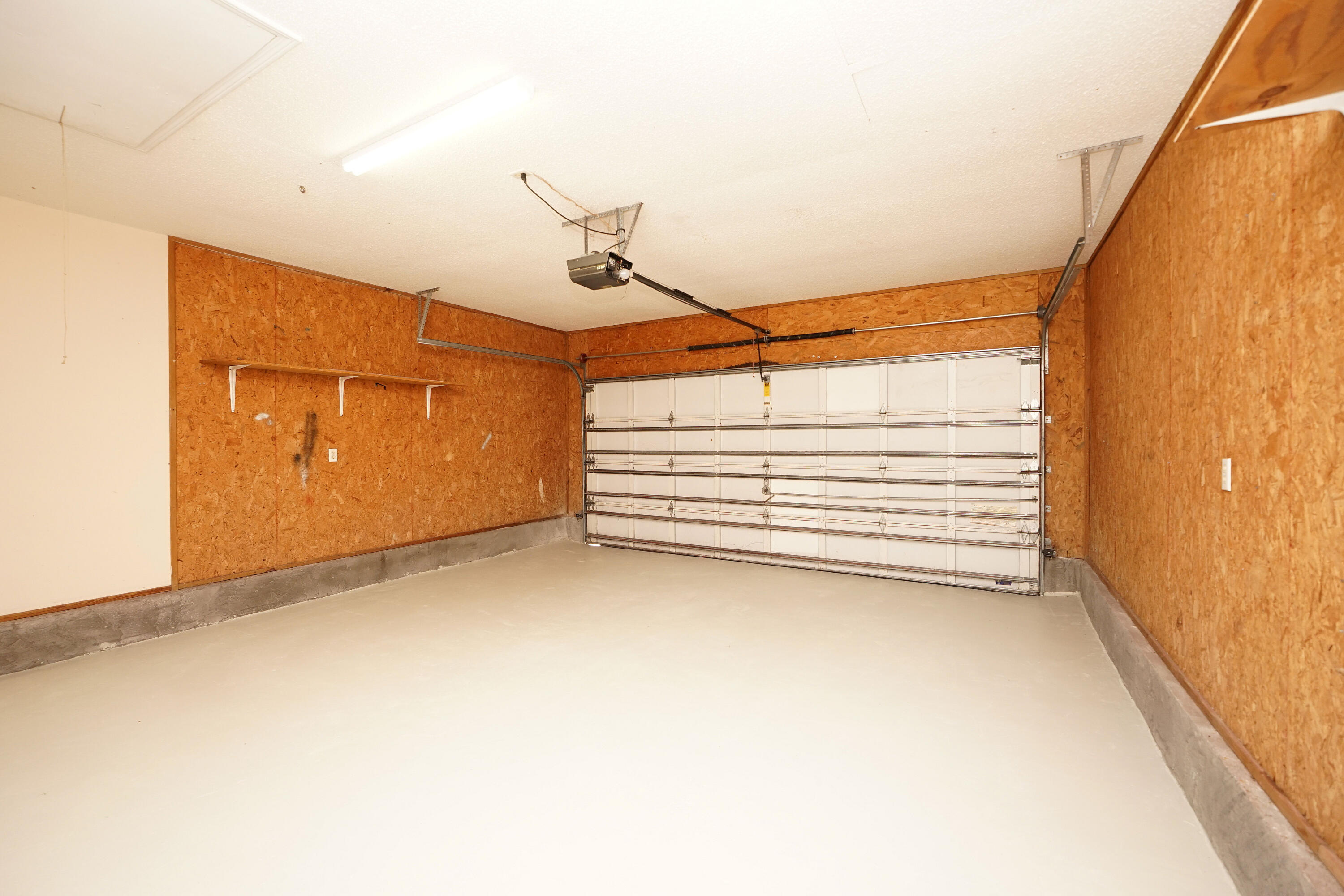 406 Springate Court Mary Esther, FL 32569 - Photo 11 of 41 a view of a room with racks on the wall