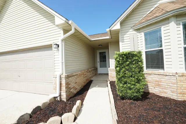 a view of a back yard of the house