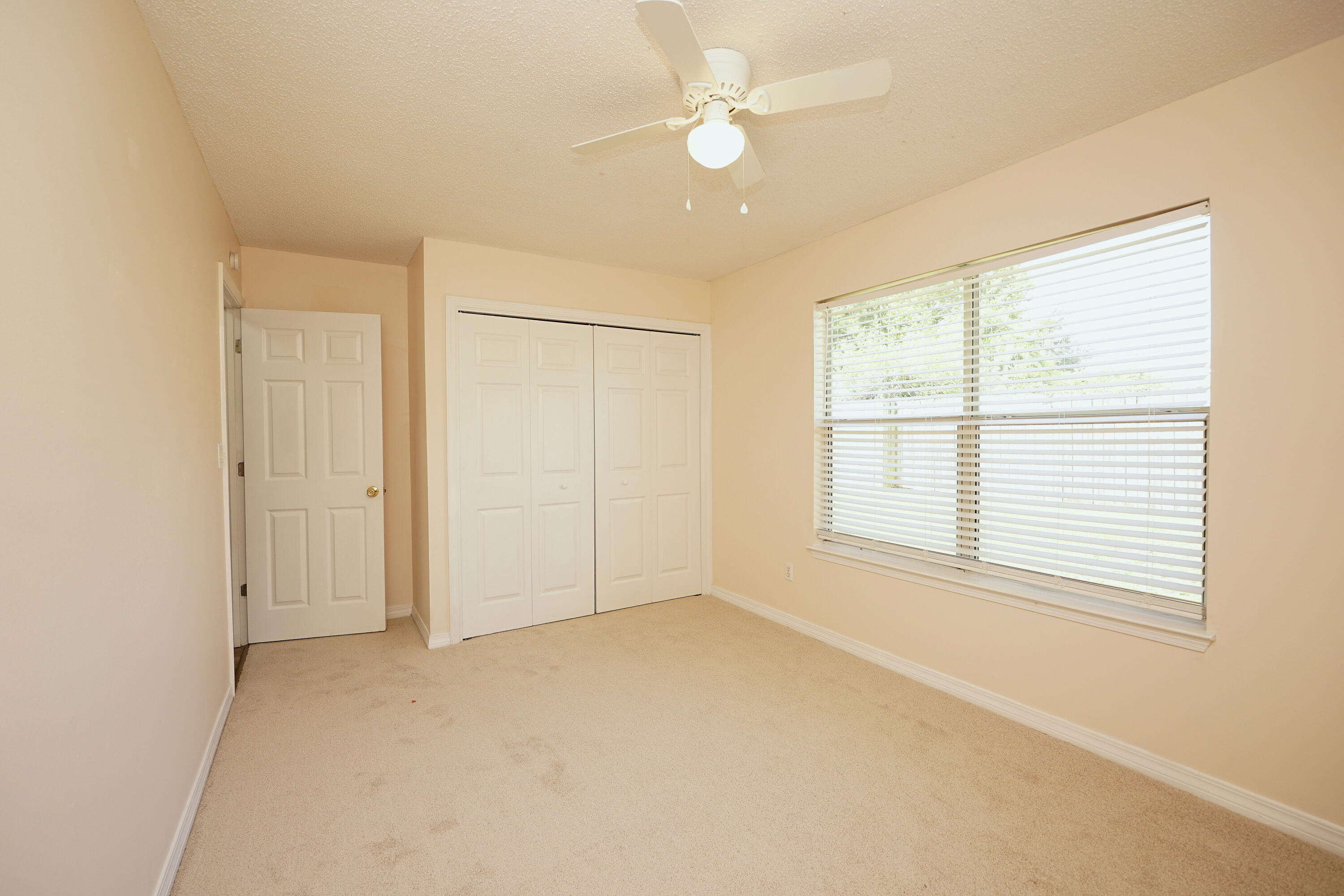 406 Springate Court Mary Esther, FL 32569 - Photo 32 of 41 a view of an empty room with a window