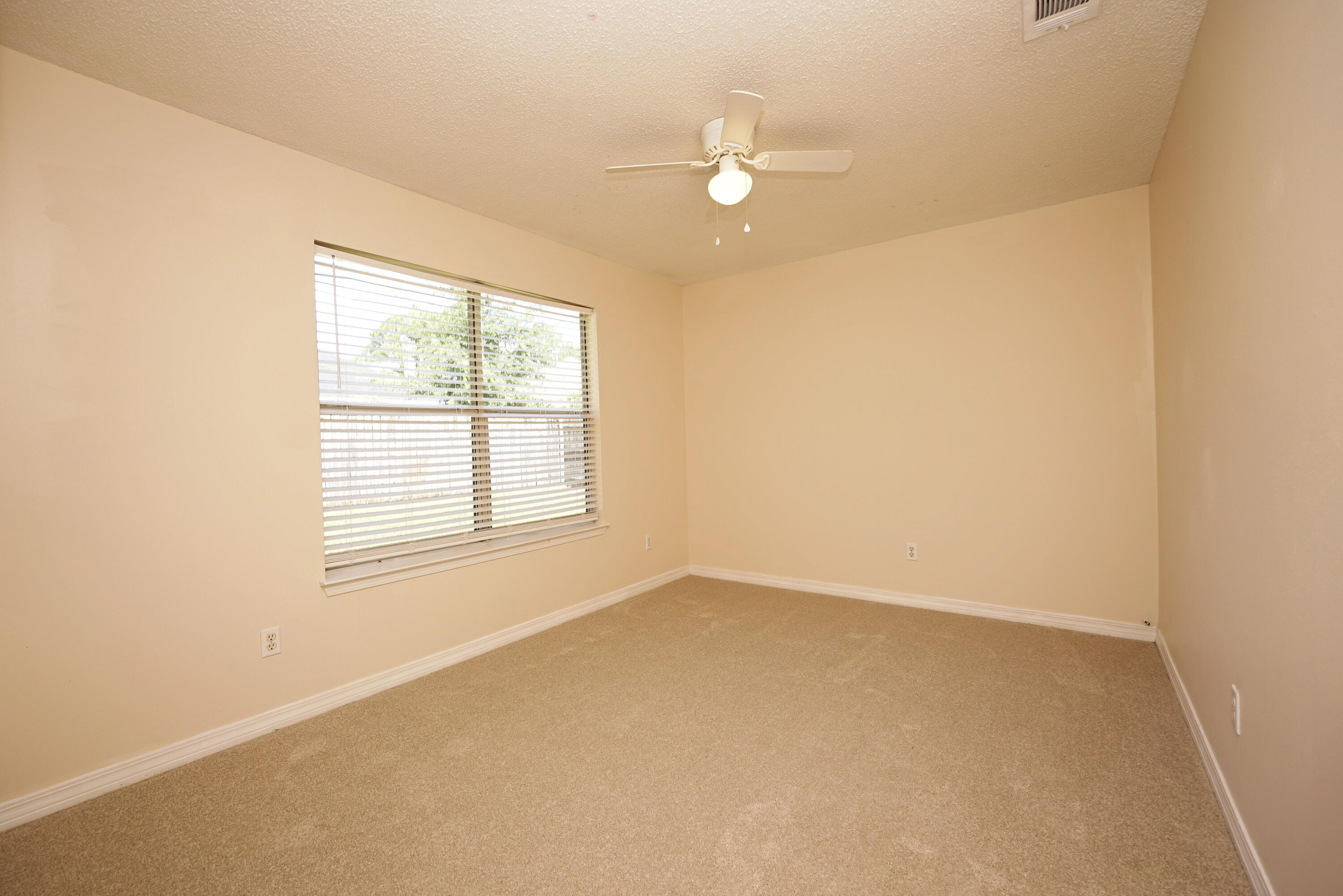 406 Springate Court Mary Esther, FL 32569 - Photo 33 of 41 an empty room with a window