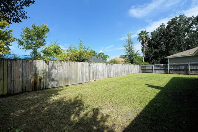 a view of a backyard with a garden