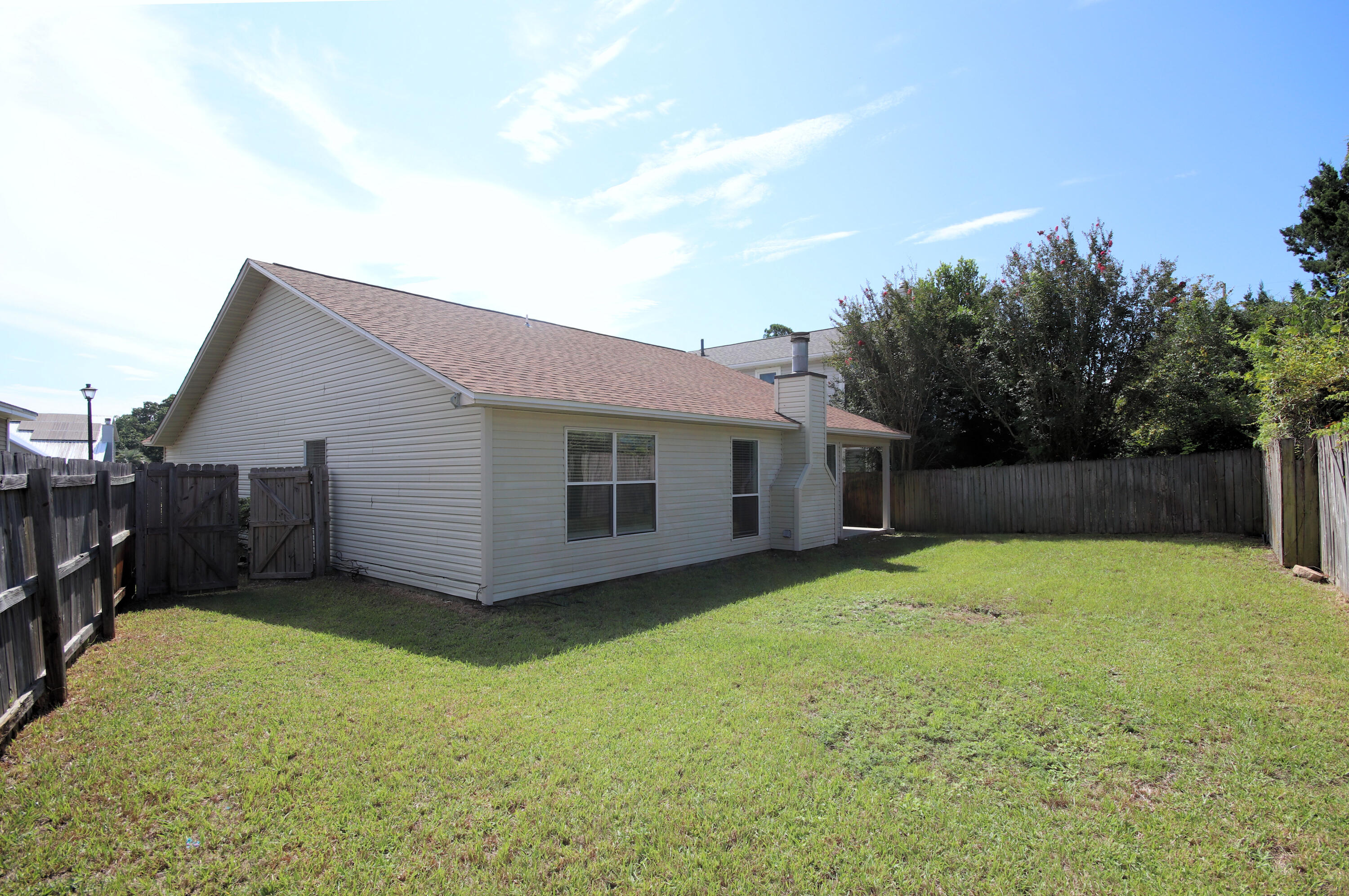 406 Springate Court Mary Esther, FL 32569 - Photo 40 of 41 a backyard of a house