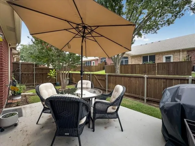 a view of chair and table in the patio