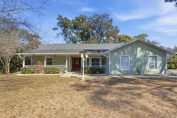 front view of a house with a patio