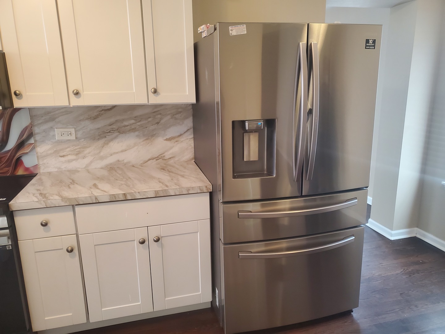 2422 12th Avenue Broadview, IL 60155 - Photo 12 of 34 a kitchen with cabinets and a stainless steel appliances