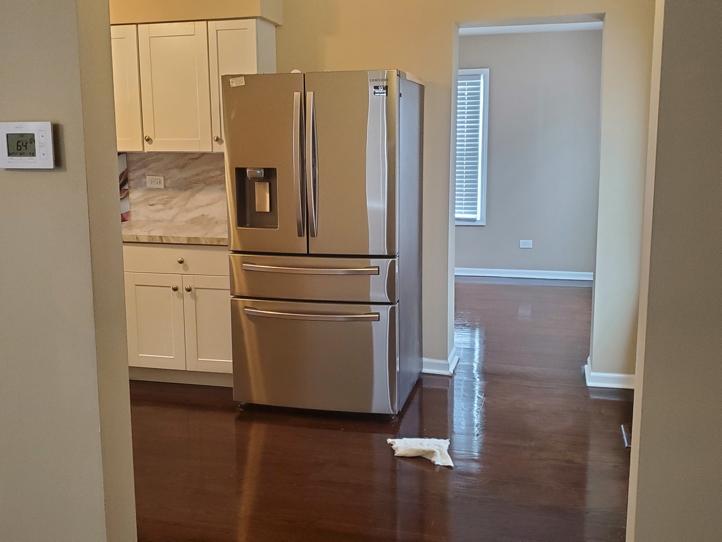 2422 12th Avenue Broadview, IL 60155 - Photo 16 of 34 a white refrigerator freezer sitting inside of a kitchen