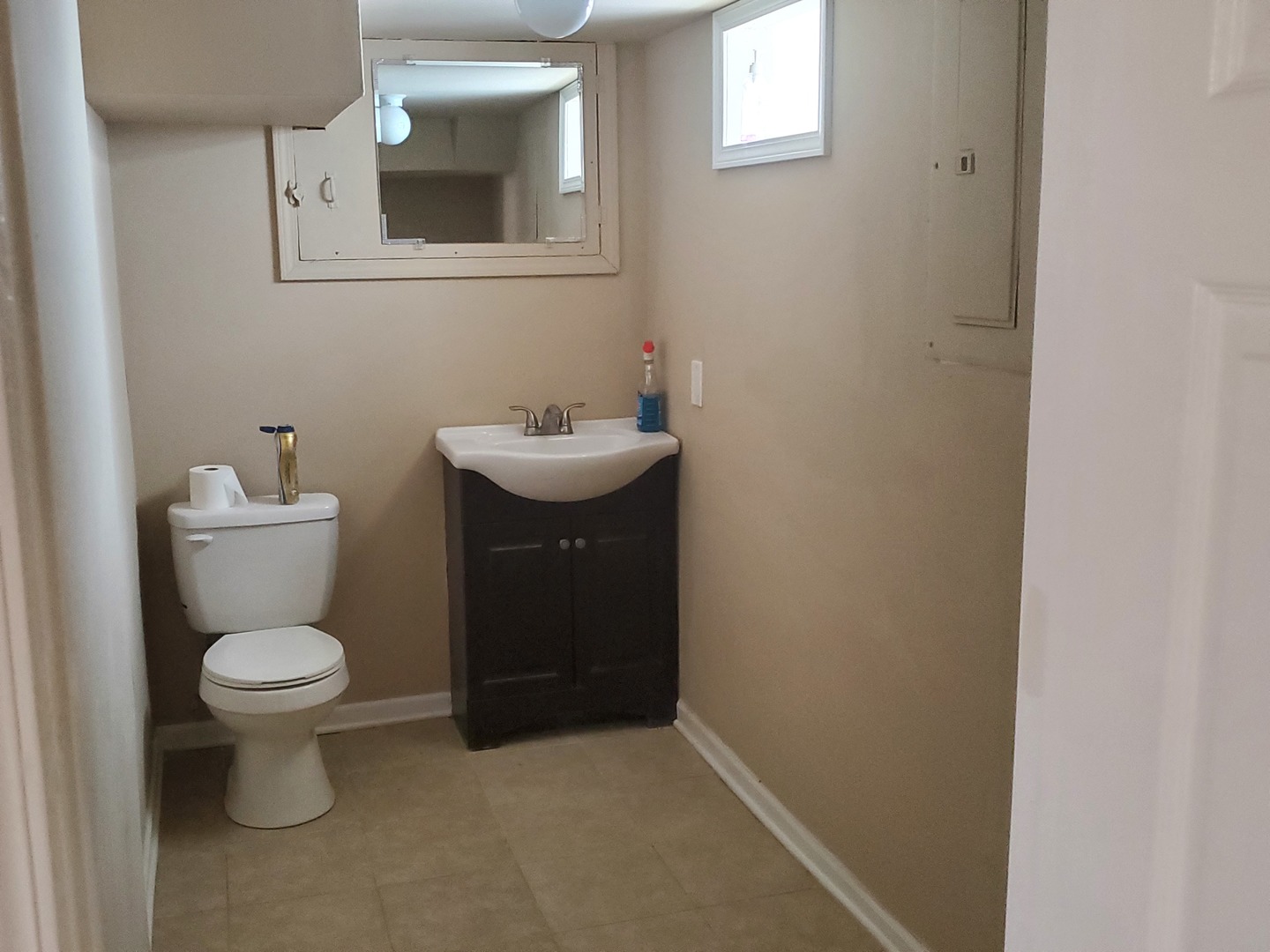 2422 12th Avenue Broadview, IL 60155 - Photo 24 of 34 a bathroom with a sink and a toilet