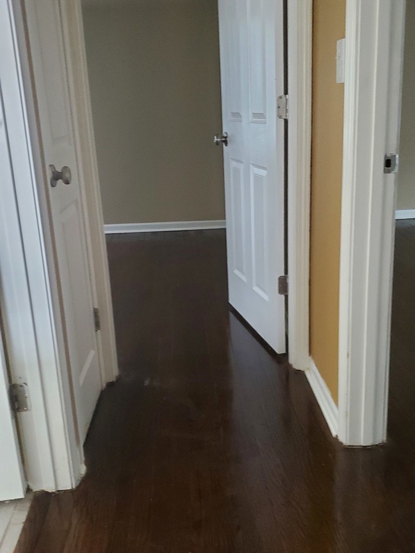 2422 12th Avenue Broadview, IL 60155 - Photo 28 of 34 an empty room with wooden floor