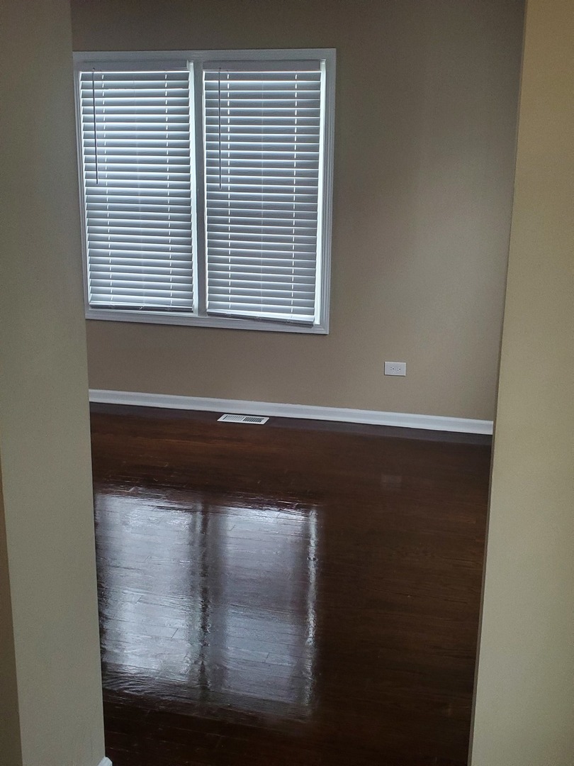 2422 12th Avenue Broadview, IL 60155 - Photo 29 of 34 a view of wooden floor and a window
