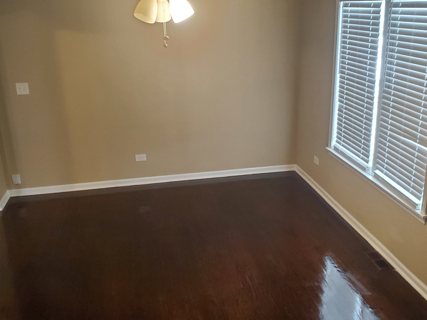 2422 12th Avenue Broadview, IL 60155 - Photo 32 of 34 a view of a small space with wooden floor and a window