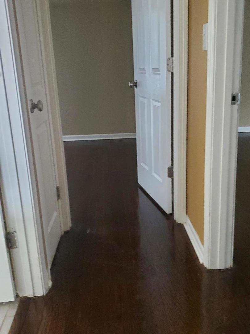 2422 12th Avenue Broadview, IL 60155 - Photo 33 of 34 an empty room with wooden floor