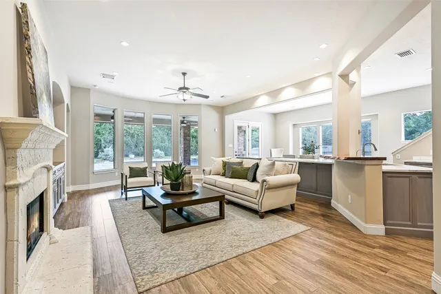 a dining room with furniture and wooden floor