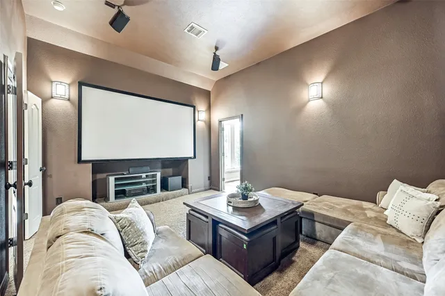 a view of yard with swimming pool and green space