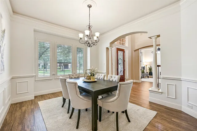 a living room with furniture fireplace and window