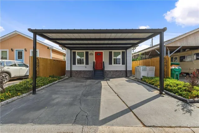 a front view of a house with a garage