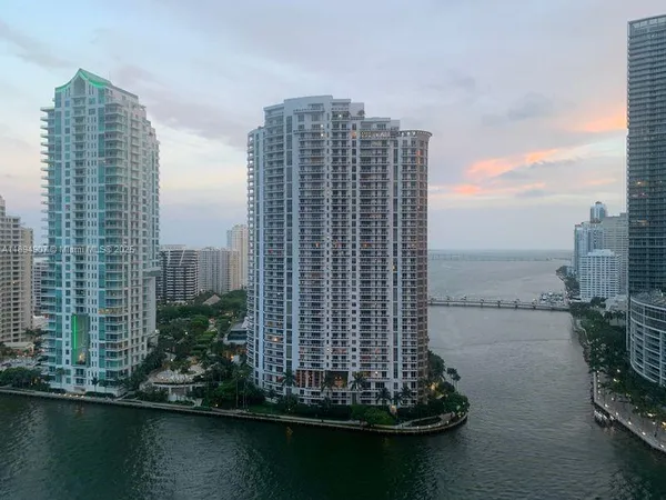 a view of a city with tall buildings