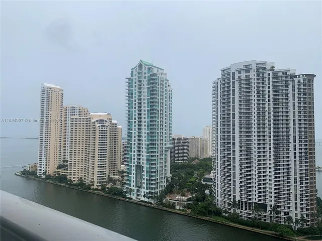 a view of a city with tall buildings