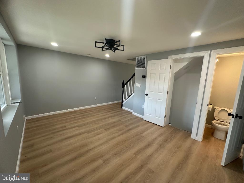 2507 Riggs Avenue Baltimore, MD 21216 - Photo 4 of 17 Living Room & Half Bathroom