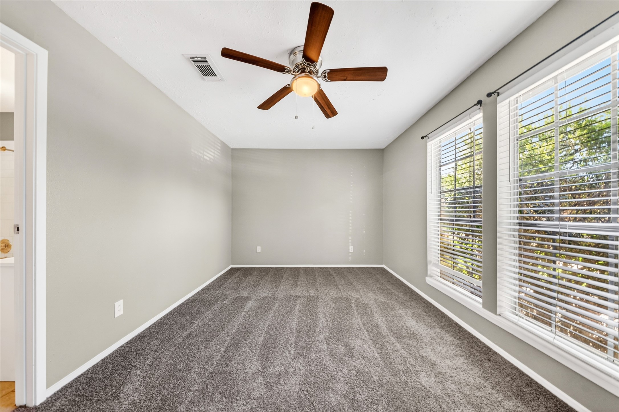 3119 Oak Rock Spring, TX 77373 - Photo 8 of 25 a view of room with a ceiling fan and window