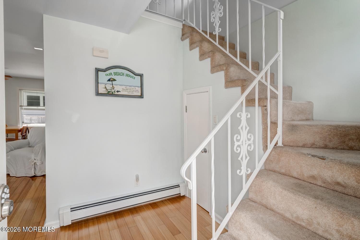 19 Shore Way Lavallette, NJ 08735 - Photo 4 of 38 a view of staircase with wooden floor and white walls