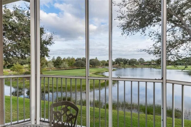 a view of a lake from a balcony
