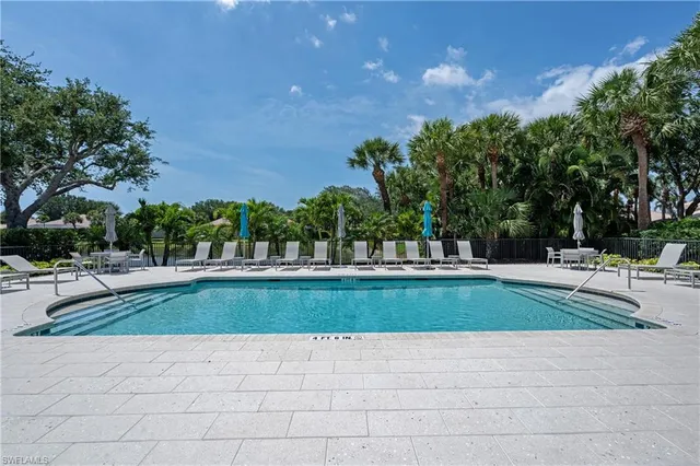 a view of a livingroom with furniture and windows