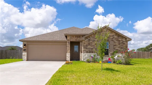 a front view of house with yard